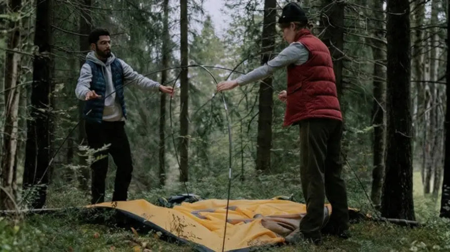 Tent setup in woods