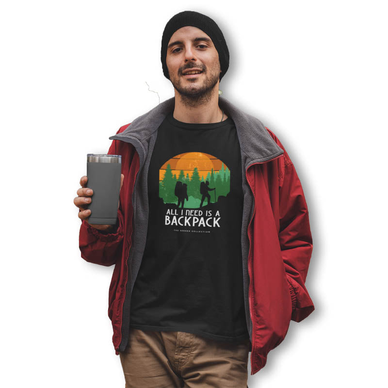 Black Men's T-shirt from The Mahua Store with "All I Need is a Backpack" print, casual fit and comfortable fabric.