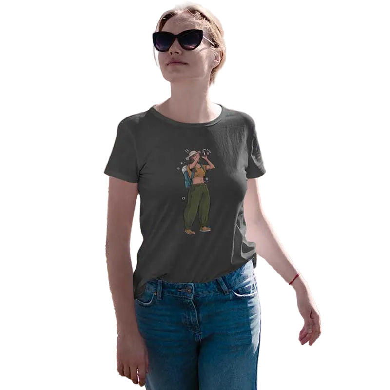 Grey women's T-shirt by The Mahua Store featuring a bold explorer female print on the front.