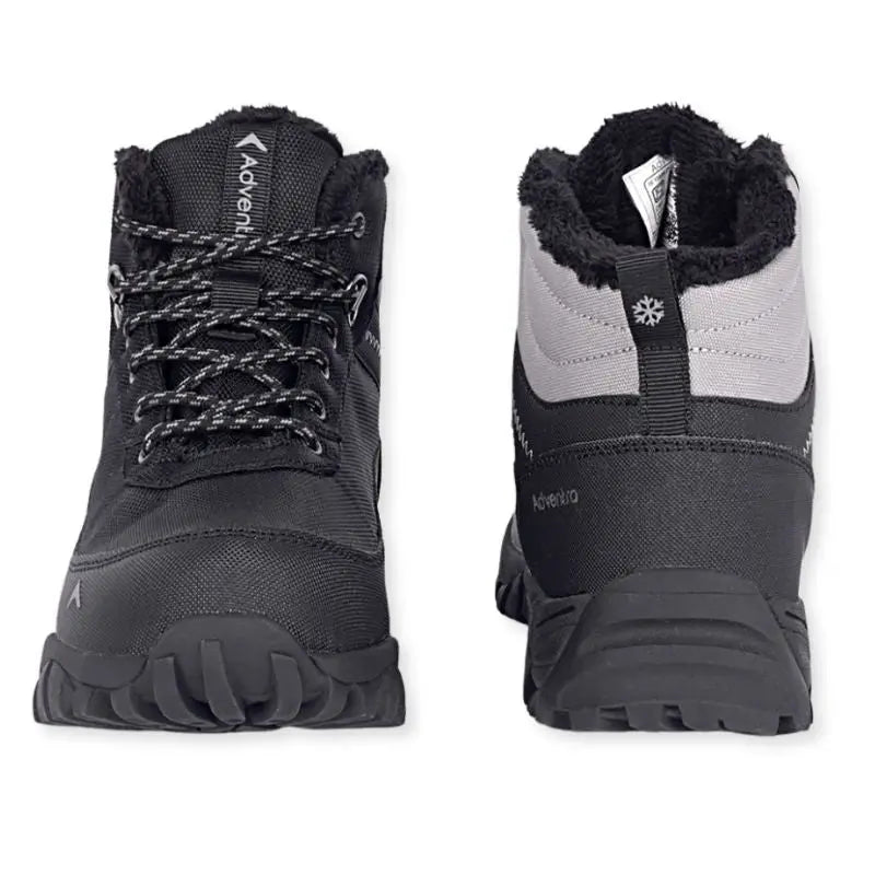 Black Adventra men's waterproof hiking shoes with sturdy soles and padded ankles, ideal for outdoor trekking and rugged terrains.