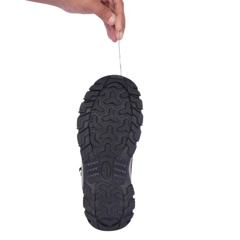 Adventra men's waterproof hiking mid-ankle shoes with green fabric and rugged soles, designed for outdoor adventures.
