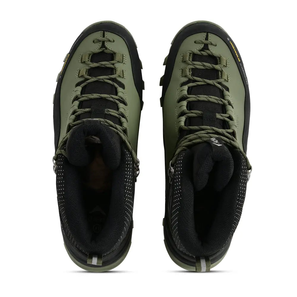 Adventra men's waterproof winter hiking mid-ankle shoes with green upper and rugged sole, designed for warmth and durability.