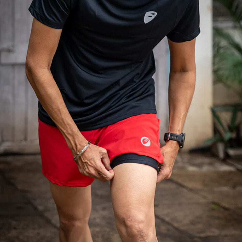 Apace men's 5-inch running shorts in black with a lightweight fabric and elastic waistband, designed for active running and exercise.