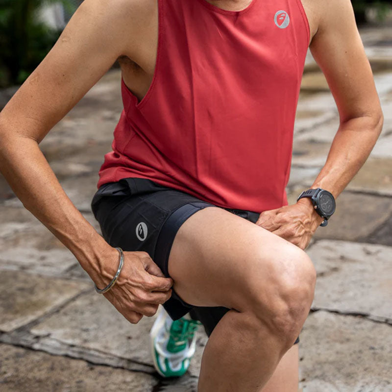 Apace men's 5-inch running shorts in charcoal color, lightweight athletic shorts with a sleek design and elastic waistband.