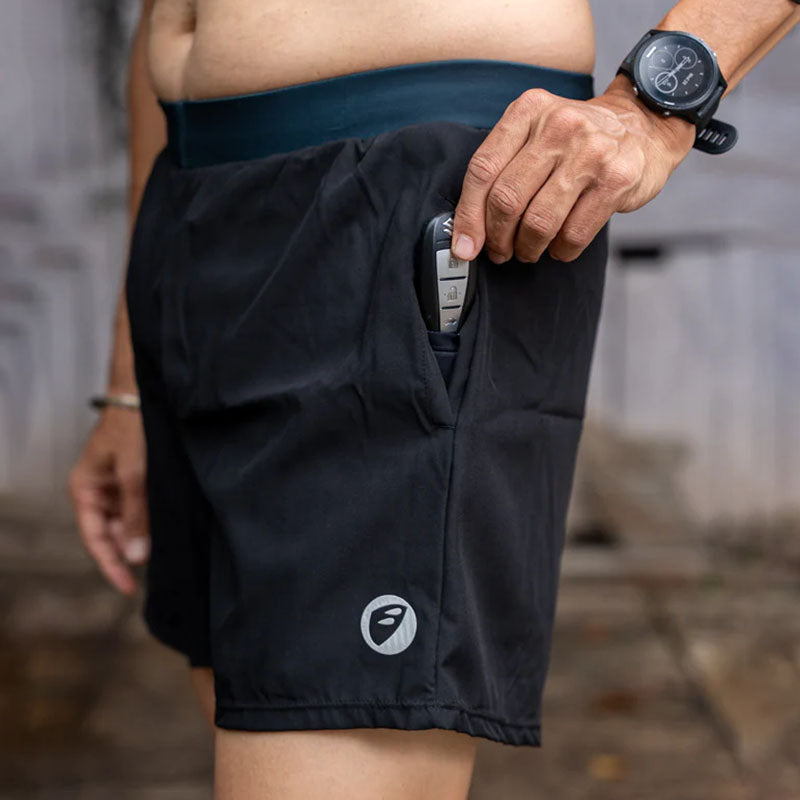 Apace men's 5-inch running shorts in carbon color, featuring lightweight fabric and elastic waistband for active wear.