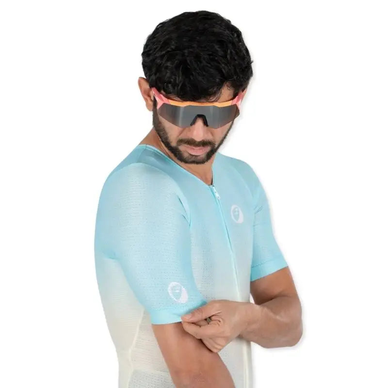 Apace Men's Elite Fit Cycling Jersey in gray, featuring a full front zipper and breathable fabric for comfortable riding.