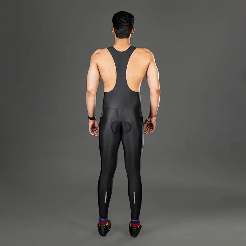 Apace men's gel padded cycling bib full tights shorts, close-up view of black cycle shorts with padded seat and fitted design.