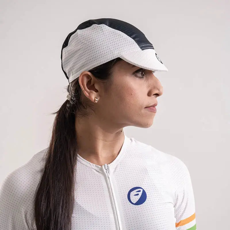 A unisex Apace Cycling Hustle Cap made of lightweight headwear fabric, featuring a curved brim and adjustable strap.