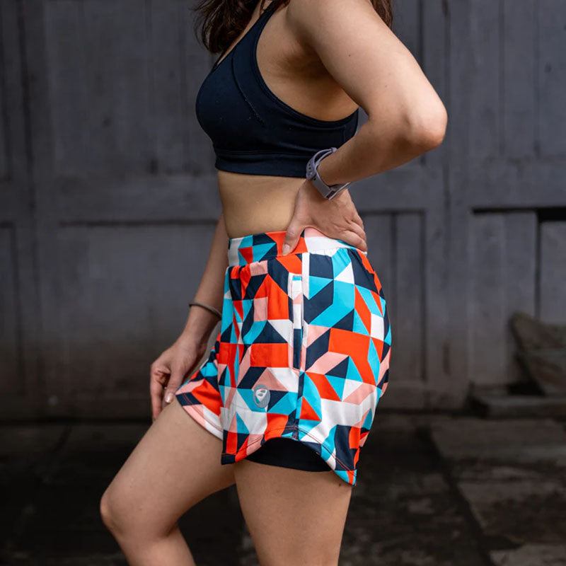 Apace women's 3-inch running shorts in lightweight fabric, featuring an art deco pattern on the side.