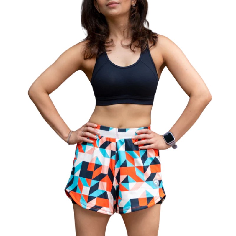 Apace women's 3-inch running shorts in lightweight fabric, shown with a close-up of the stylish Art Deco pattern on the waistband.