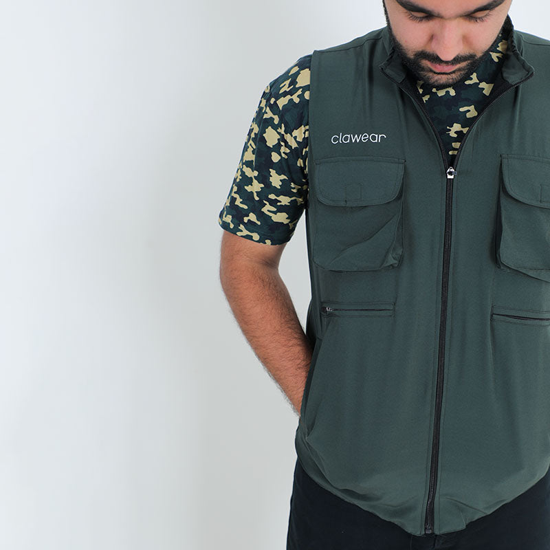 Clawear Mens Corbett 2.0 vest jacket in green with front zipper and padded design, shown on a hanger.