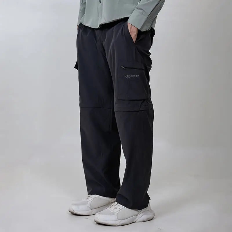 Clawear men's Kuno convertible cargo pants in gray, featuring multiple pockets and adjustable hems for versatile wear.