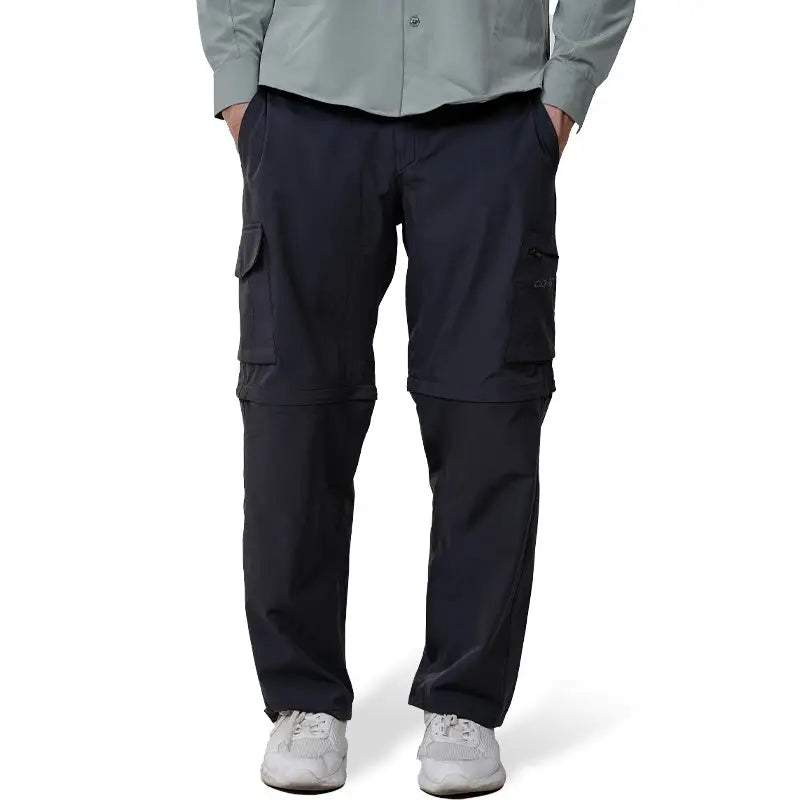 Black Clawear Kuno convertible cargo pants for men, featuring multiple pockets and adjustable features for versatile wear.