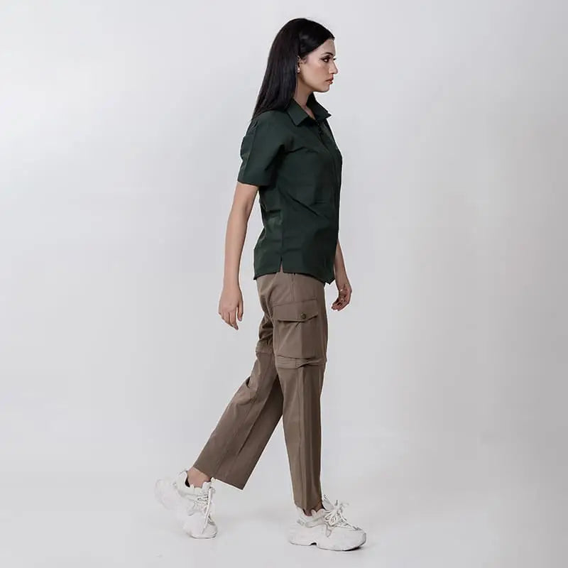 Clawear women's Kuno convertible cargo pants in brown, featuring multiple pockets and adjustable features for versatile wear.