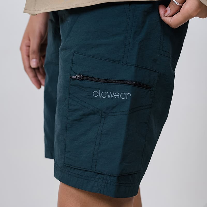 Clawear Women's Mara Cargo Shorts in green, featuring multiple pockets and a relaxed fit, suitable for casual wear.