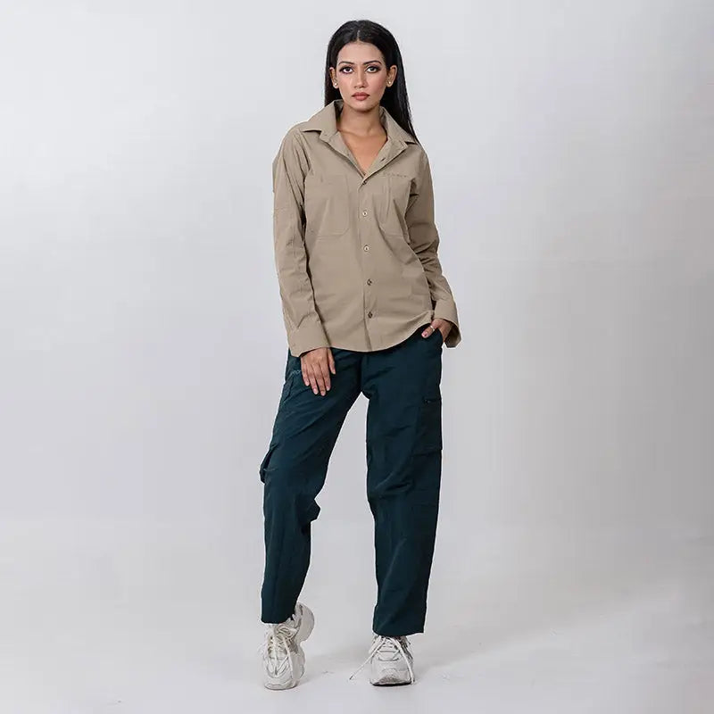 Clawear Women's Masai cargo pants in green, featuring multiple pockets and relaxed fit, made for comfortable casual wear.