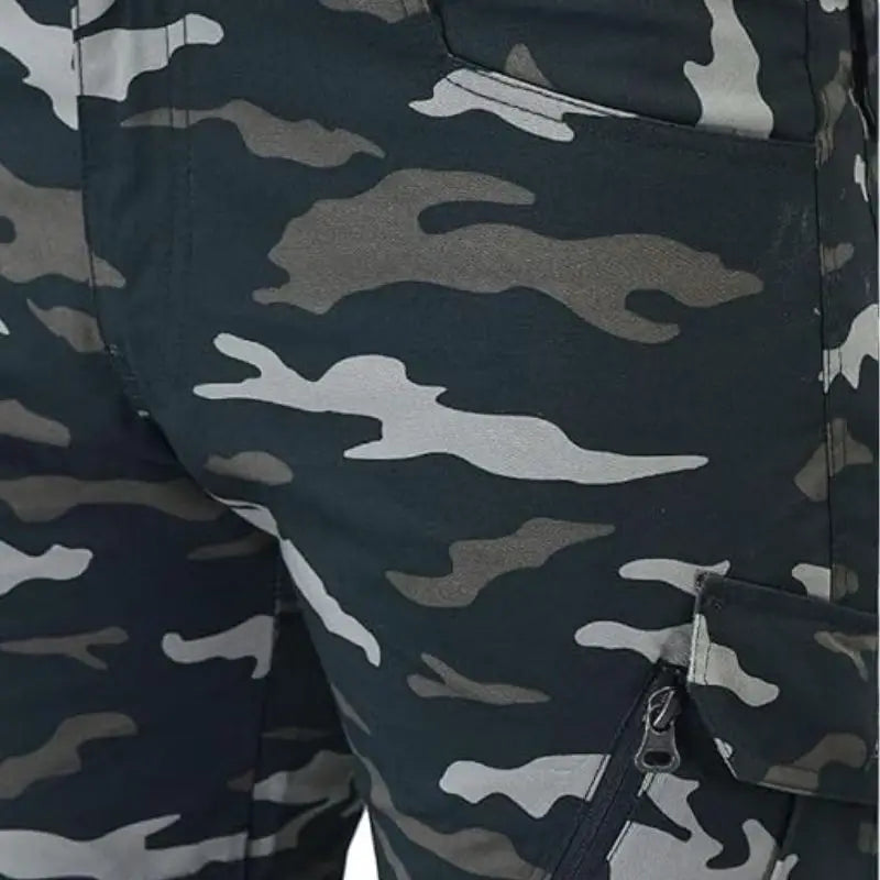 Indian Sports Gear men's Cobra Combat tactical cargo pants in dark green, featuring multiple pockets and durable military-style design.