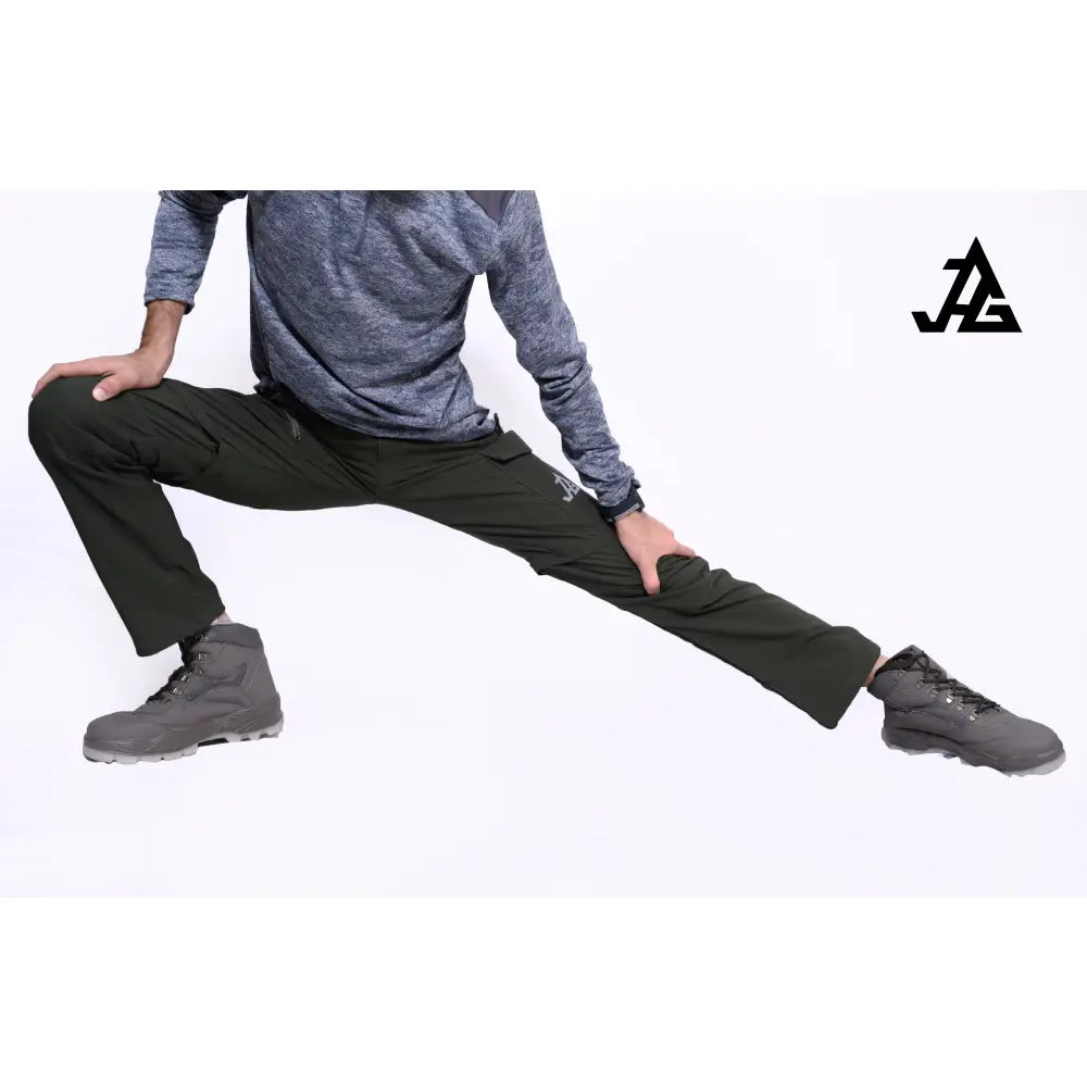 JAG Men's Discovery Series convertible cargo pants with zip-off legs, multiple pockets, and durable fabric for hiking and travel adventures.