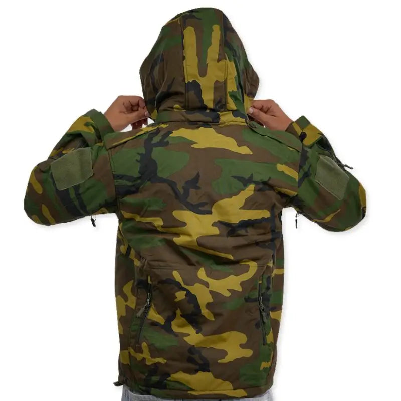 NLTW men's military woodland camo softshell jacket with multiple pockets, ideal for tactical outdoor wear and rugged outdoor activities.