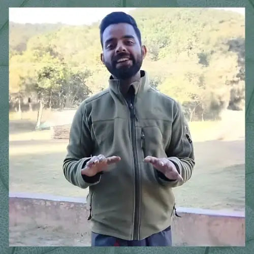 Olive green fleece jacket with zippered pockets and a high collar