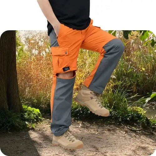 Orange and gray tactical cargo pants with reinforced knee panels.
