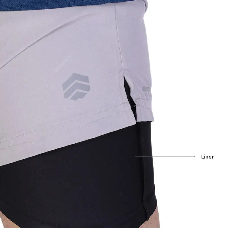 Gray Ruggd Indian men's running shorts with multiple pockets and built-in liner, designed for active and comfortable wear.
