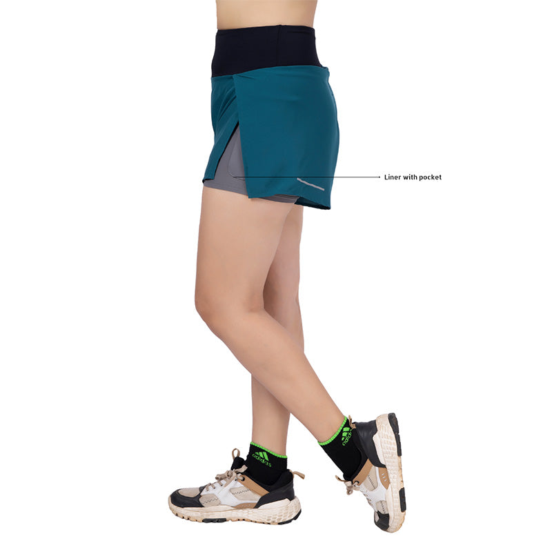 Ruggd Indian women's feather light running active speed shorts in vibrant green, designed for comfortable athletic performance.