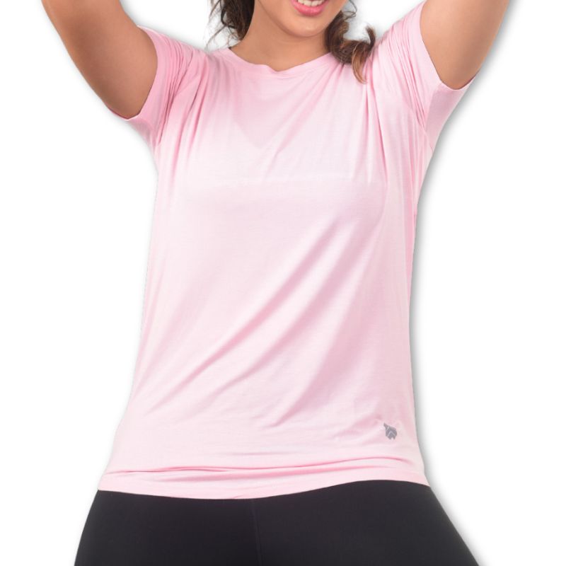 Pink Ruggd Indian women's odor-resistant bamboo training T-shirt displayed on a hanger, showcasing soft fabric and casual fit.