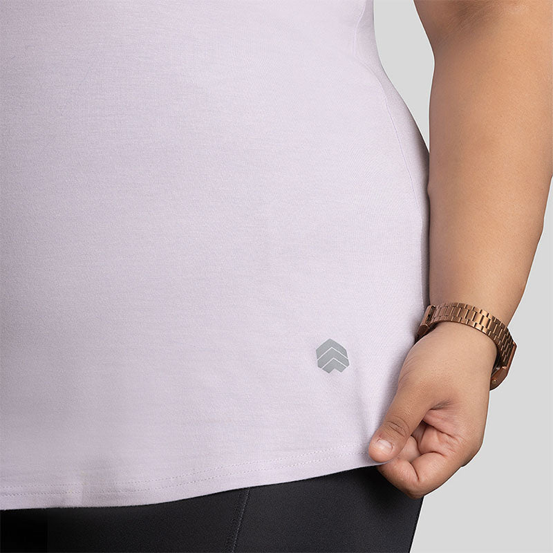 Light purple Ruggd Indian women's odor-resistant bamboo training T-shirt displayed on a hanger.