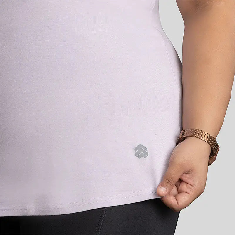 Light purple Ruggd Indian women's odor-resistant bamboo training T-shirt displayed on a hanger.