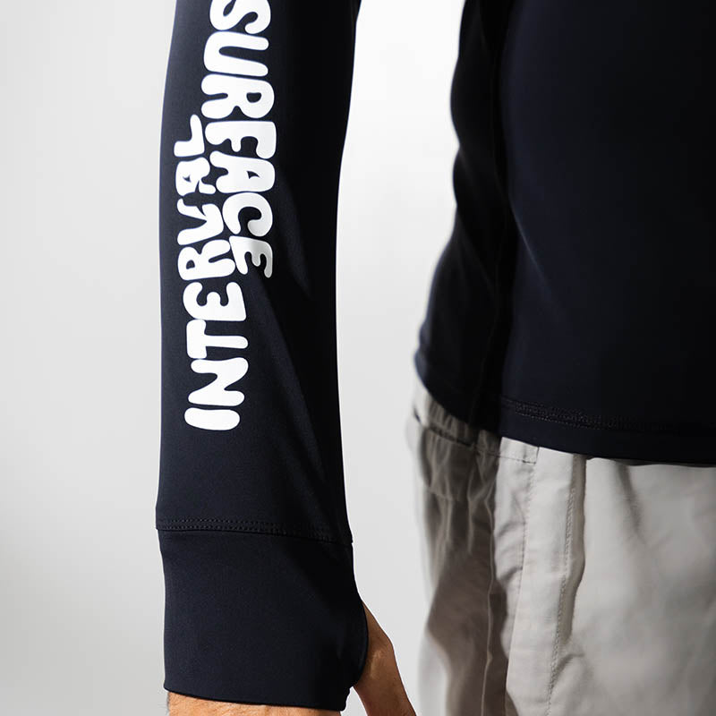 Black Surface Interval Women's Oceanic Human rash guard T-shirt with full sleeves, designed for sun protection and active wear.