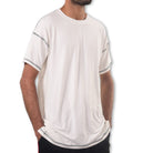 White Ruggd Indian men's odor-resistant bamboo training T-shirt displayed on a hanger with a simple background.
