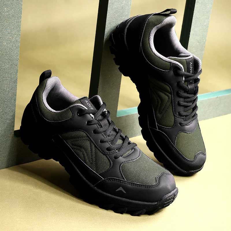 Adventra men's low ankle hiking shoes in green, featuring durable sole and supportive design for outdoor trekking.