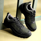 Adventra men's low ankle hiking shoes in green, featuring durable sole and supportive design for outdoor trekking.