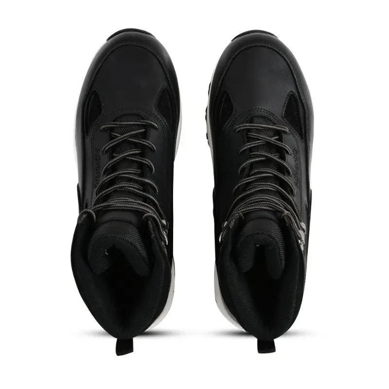 Adventra men's waterproof ankle trekking shoes in black with rugged sole and mid-high ankle support for outdoor hiking.