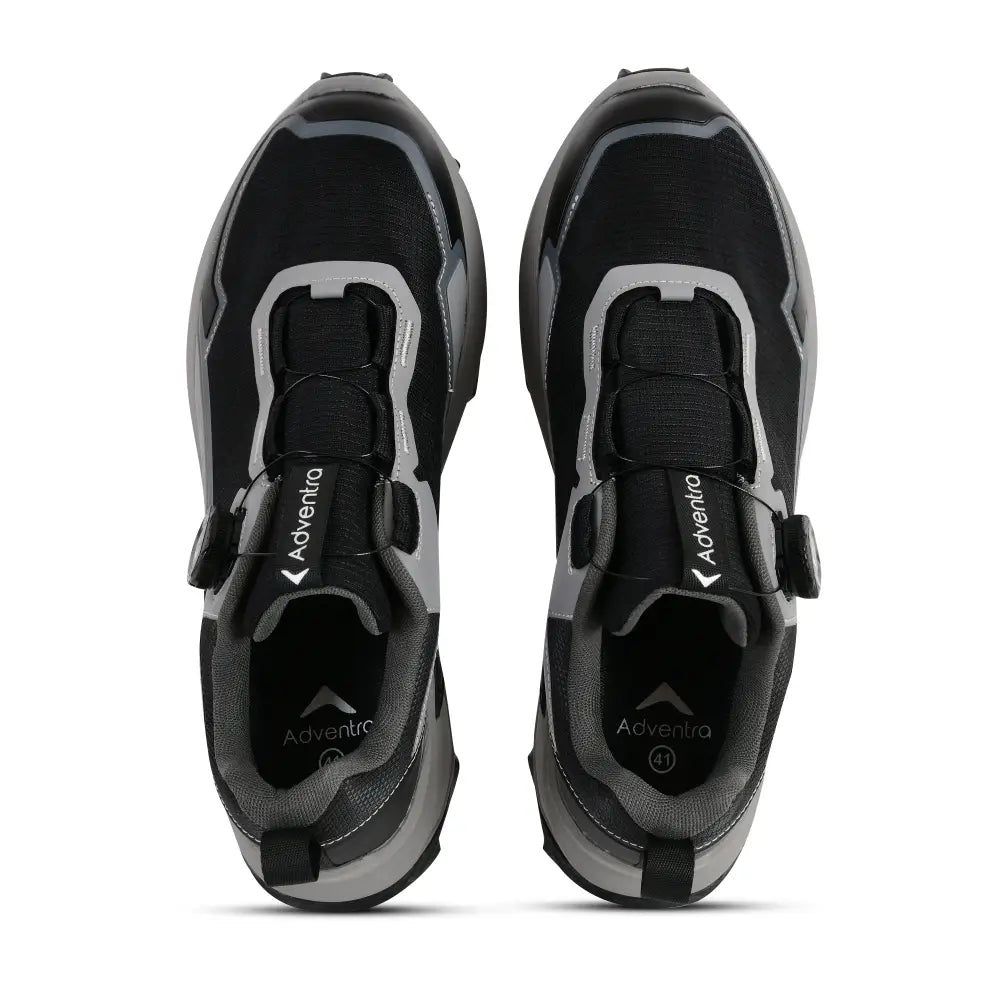 Black Adventra men's waterproof hiking shoes with low ankle design and ultra grip sole, ideal for outdoor trekking.