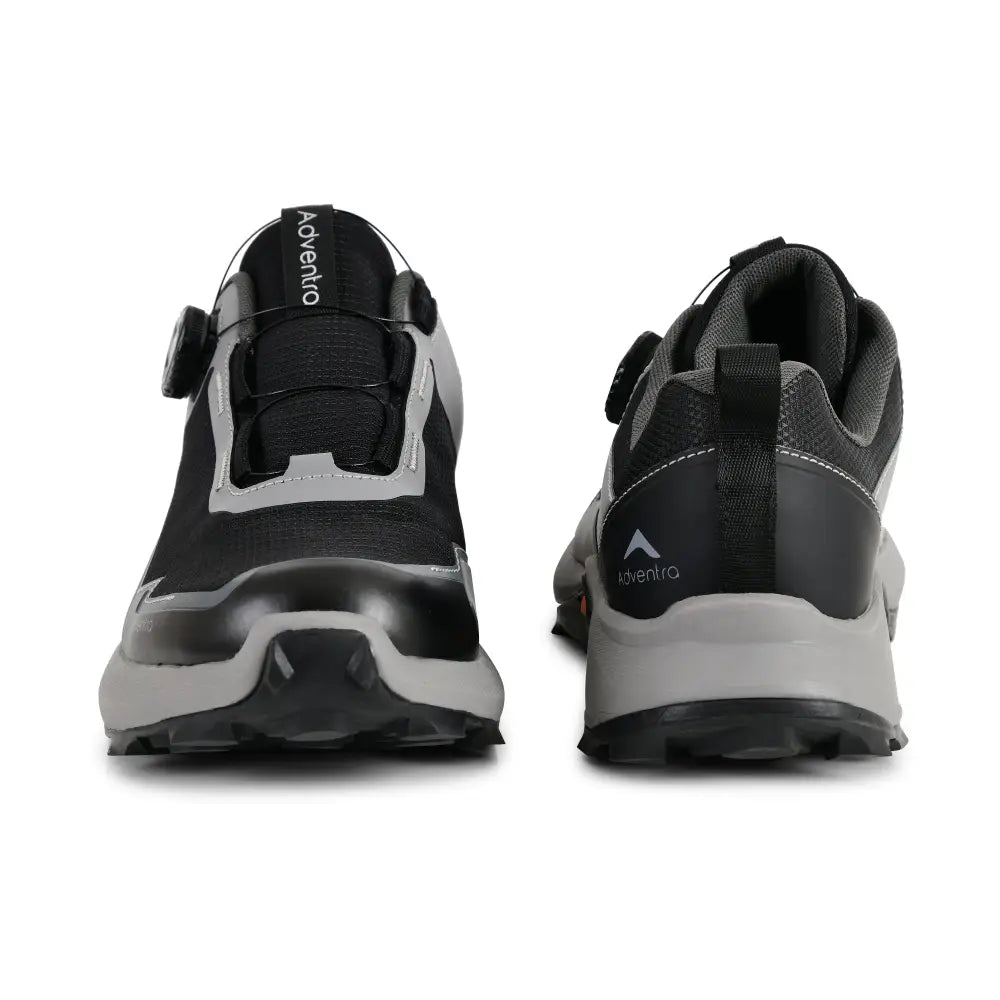 Adventra men's waterproof hiking shoes in black and gray with low ankle design and ultra grip sole, suitable for outdoor adventures.