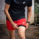 Apace men's 5-inch running shorts in black with a lightweight fabric and elastic waistband, designed for active running and exercise.