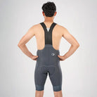 Apace Men's Cycling Endurance Bib Shorts in slate gray, designed for comfort and performance during long-distance rides.
