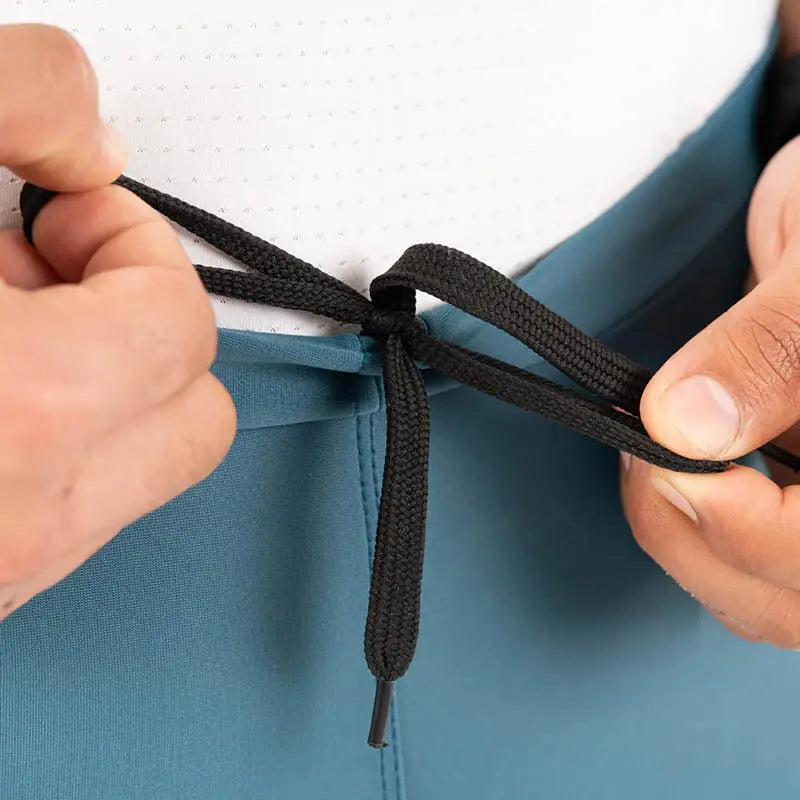 Apace men's cycling endurance bibless shorts in teal, designed for comfort and performance during long rides.