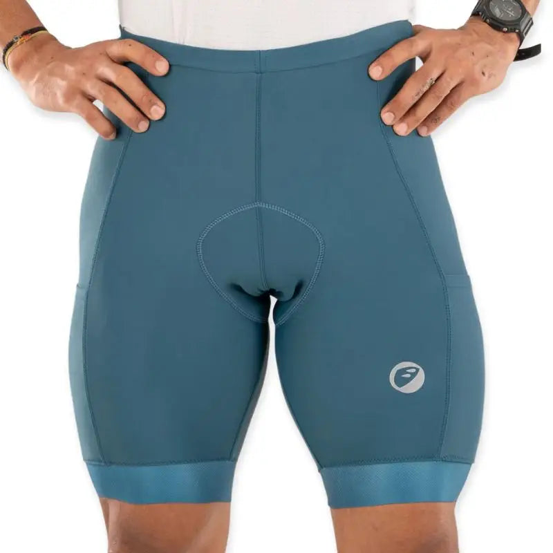 Apace Men's cycling endurance bibless shorts in teal with black accents, designed for comfort and performance.