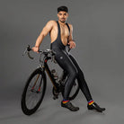 Apace men's gel padded cycling bib full tights shorts, close-up view showing black fabric and padded seat for cycling comfort.