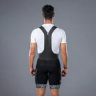 Apace men's premium cycling bib shorts showing black lycra fabric with padded seat and adjustable shoulder straps.