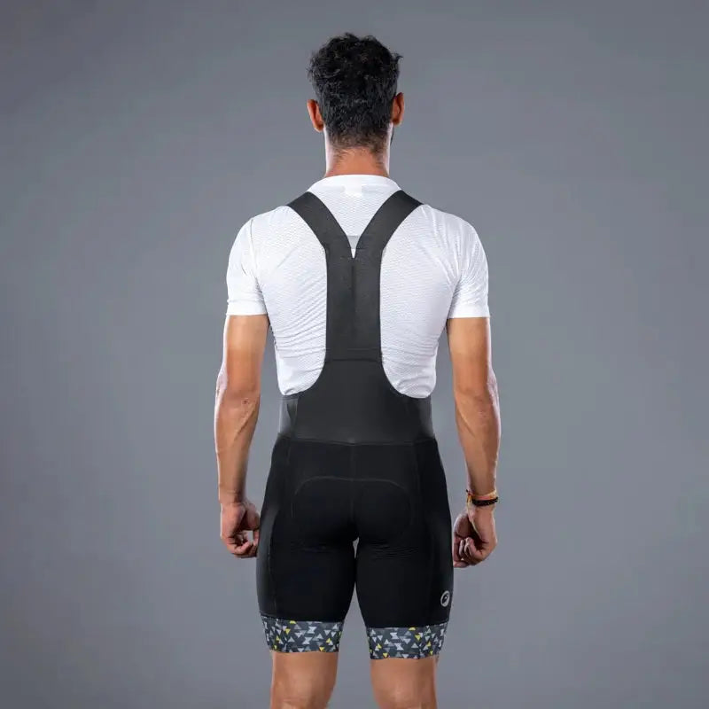 Apace men's premium cycling bib shorts showing black lycra fabric with padded seat and adjustable shoulder straps.