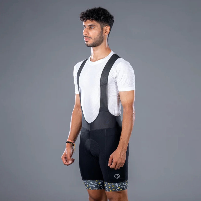 Apace men's premium cycling bib shorts in black, featuring padded seat and adjustable straps for comfortable riding.