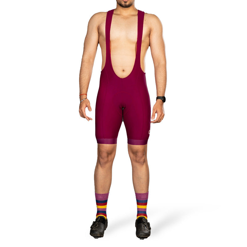 Apace men's special edition crimson racing bib shorts for cycling, featuring sleek design and lightweight, breathable fabric.