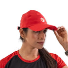 Red Apace unisex running streak cap, lightweight headwear designed for comfort and performance during outdoor activities.