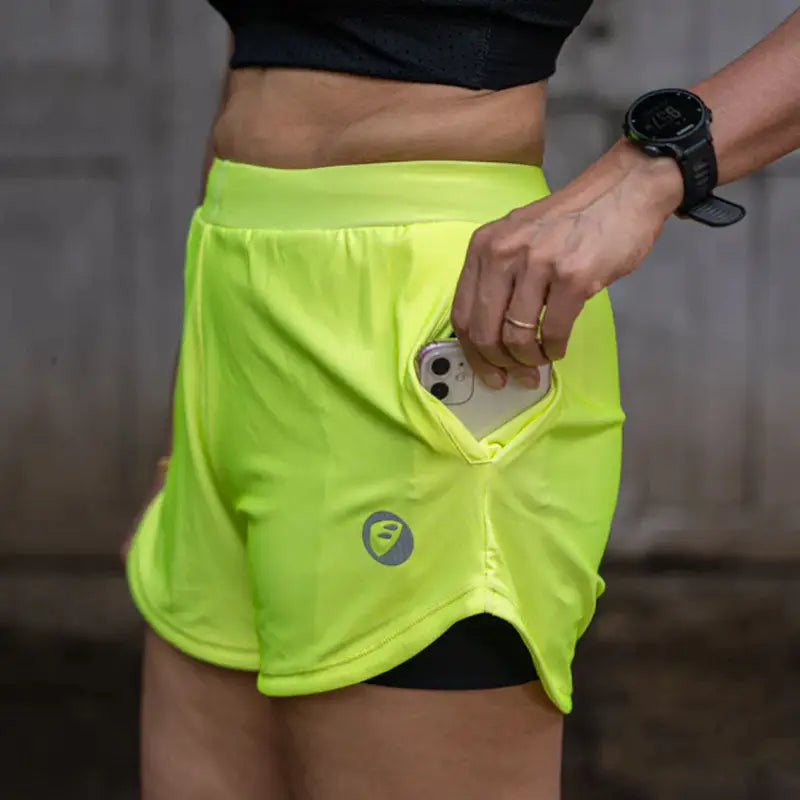 Apace Women's 3-inch running shorts in lightweight fabric, shown lying flat with a comfortable fit and sporty design.