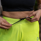 Apace women's 3-inch running shorts in lightweight fabric, shown in a side view highlighting the athletic design and comfortable fit.