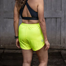 Apace Women's 3-inch running shorts in black, shown from the side, featuring a lightweight, breathable fabric for athletic wear.